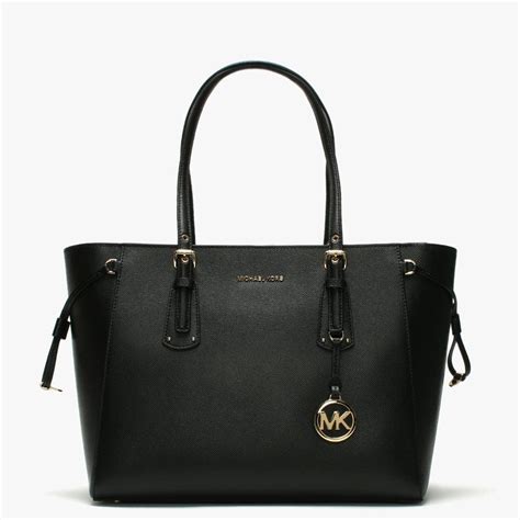 michael kors black leather tote|michael kors black canvas tote.